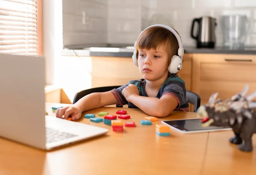 child-wearing-headphones-attendi